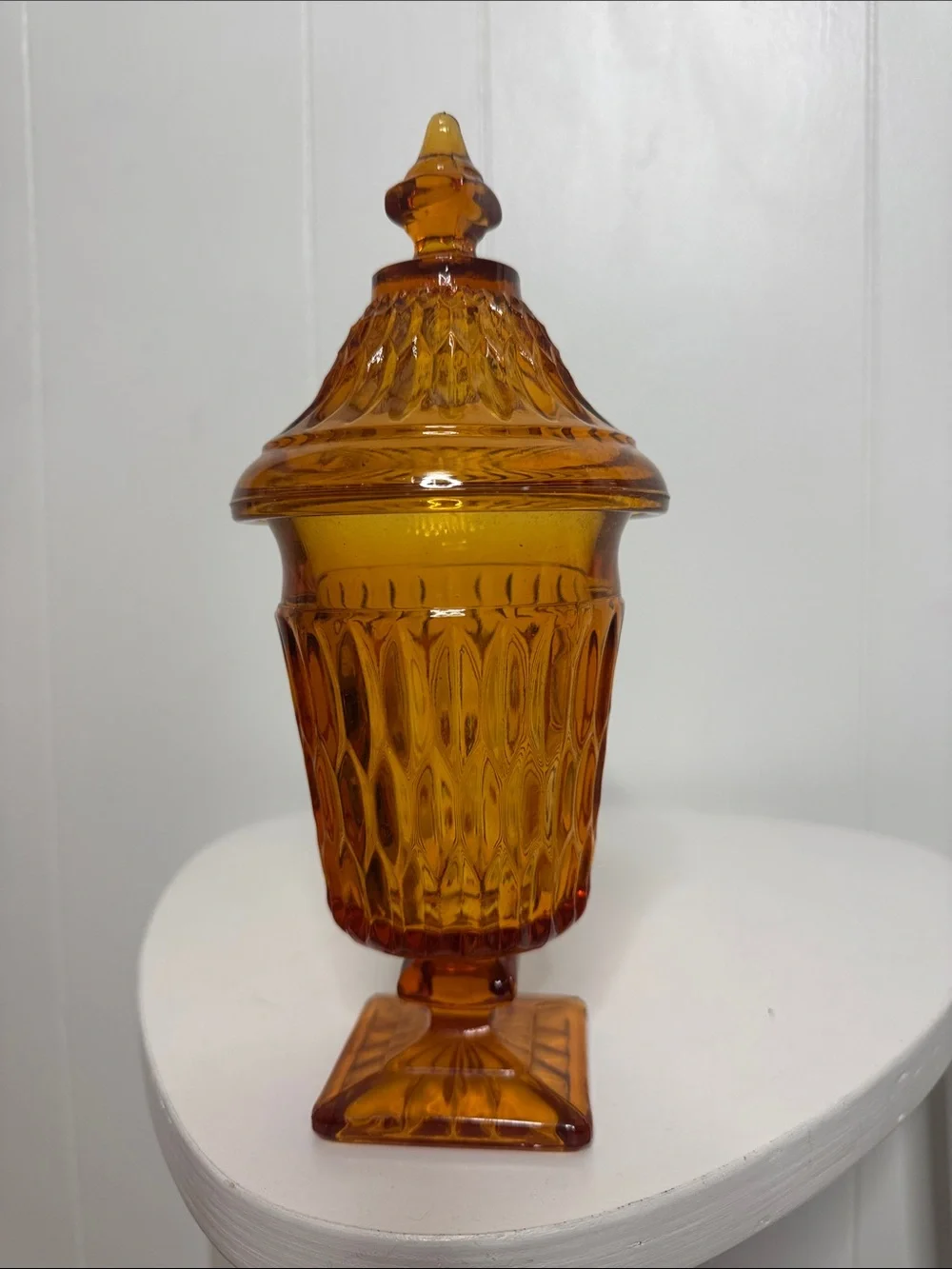 Orange glass pedestal candy dish